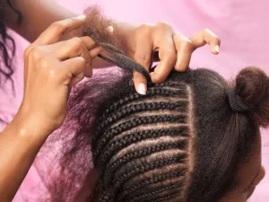 schools that allow girls to plait their hair